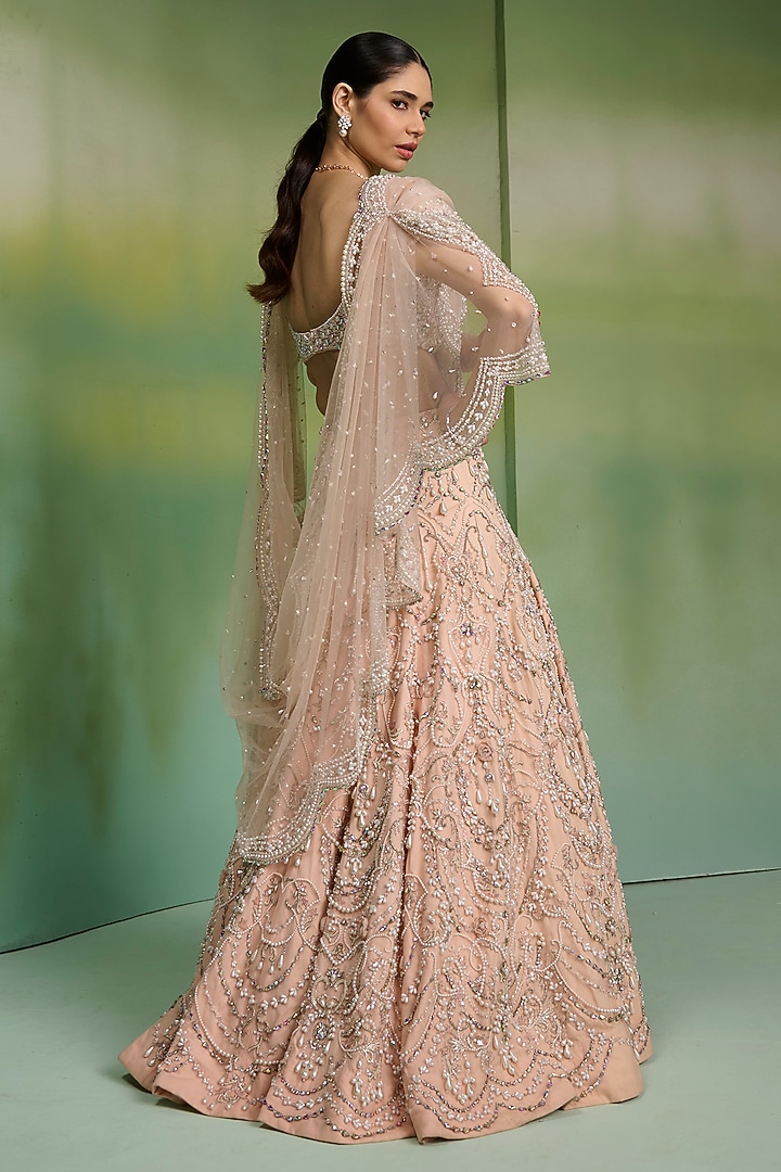Peach Tulle Pearl Hand Embroidered Bridal Lehenga Set by Mala and Kinnary at Pernia's Pop Up Shop