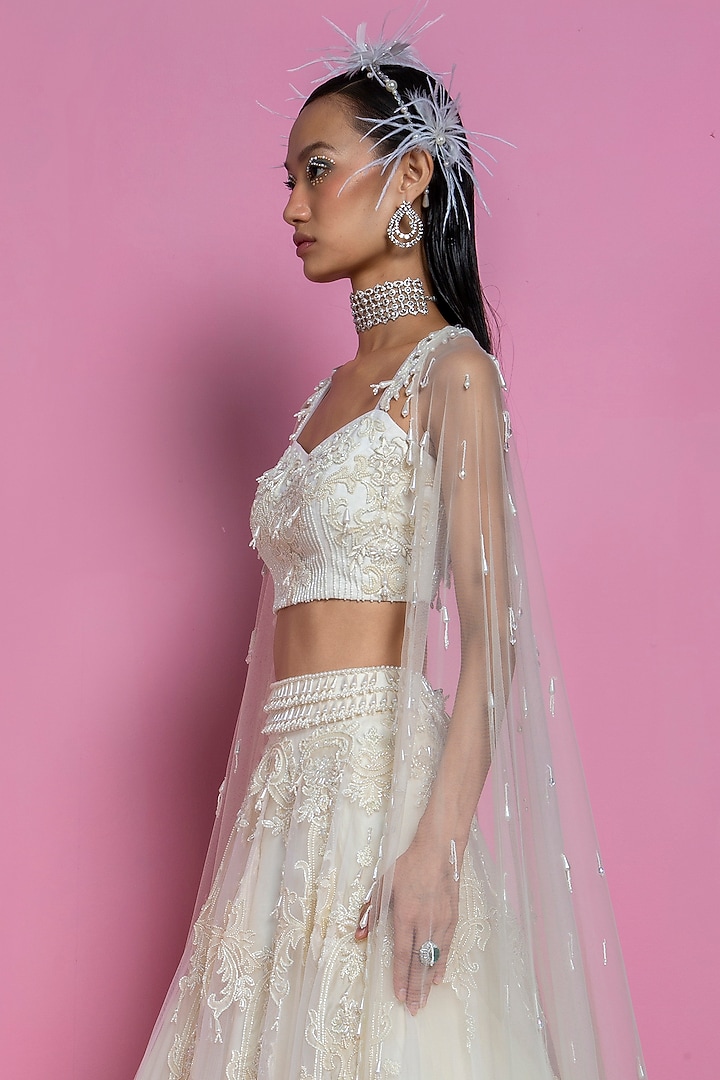 Ivory Embroidered Bridal Lehenga Set by Mala and Kinnary at Pernia's Pop Up Shop