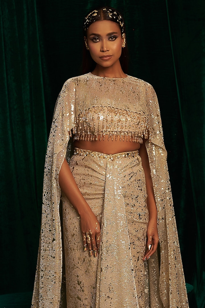 Gold Crinkle Foil Sequins Embroidered Draped Skirt Set by MEHAK MAKHIJA at Pernia's Pop Up Shop