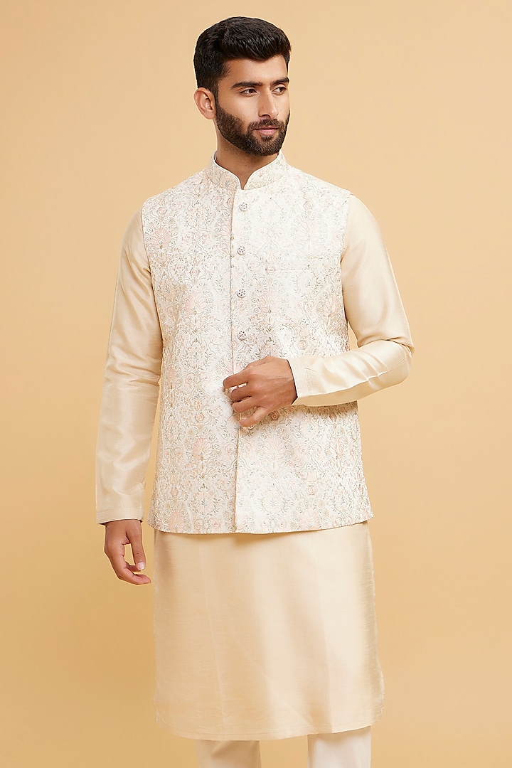 Cream Art Silk Embroidered Bundi Jacket by Twamev