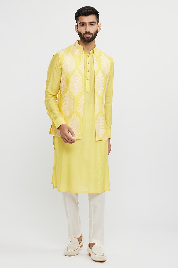 Yellow Art Silk Thread Embroidered Bundi Jacket Set by Twamev at Pernia's Pop Up Shop