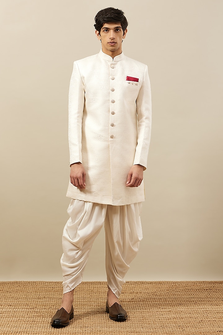 Warm White Brocade Self-Textured Indowestern Jacket Set by Manyavar