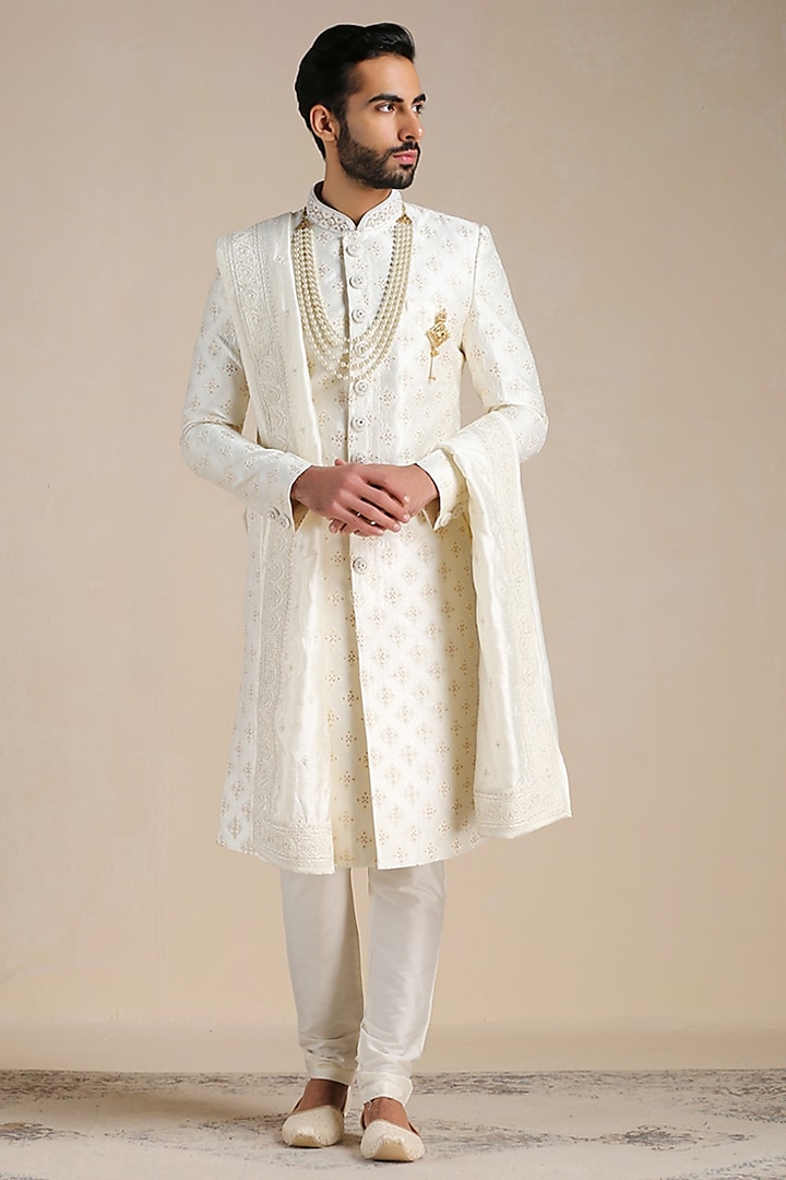 Warm White Art Silk Floral Jaal Textured Sherwani Set by Manyavar