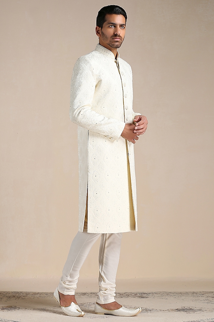 Warm White Brocade Self-Textured Sherwani Set by Manyavar