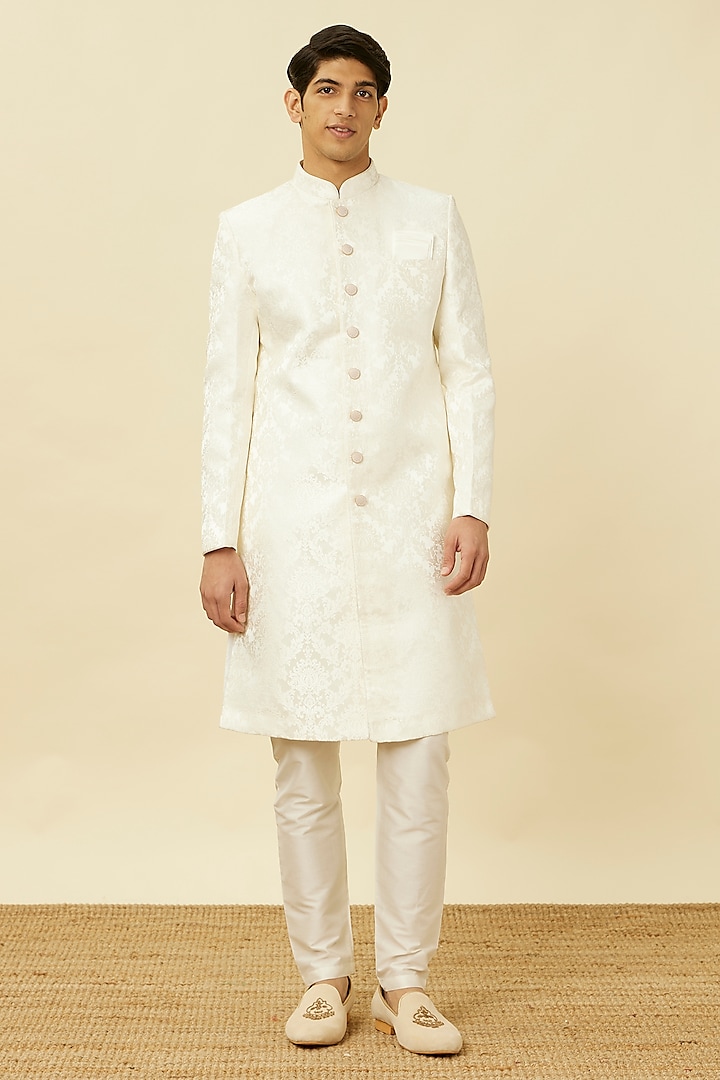 Warm White Brocade Self-Textured Sherwani Set by Manyavar