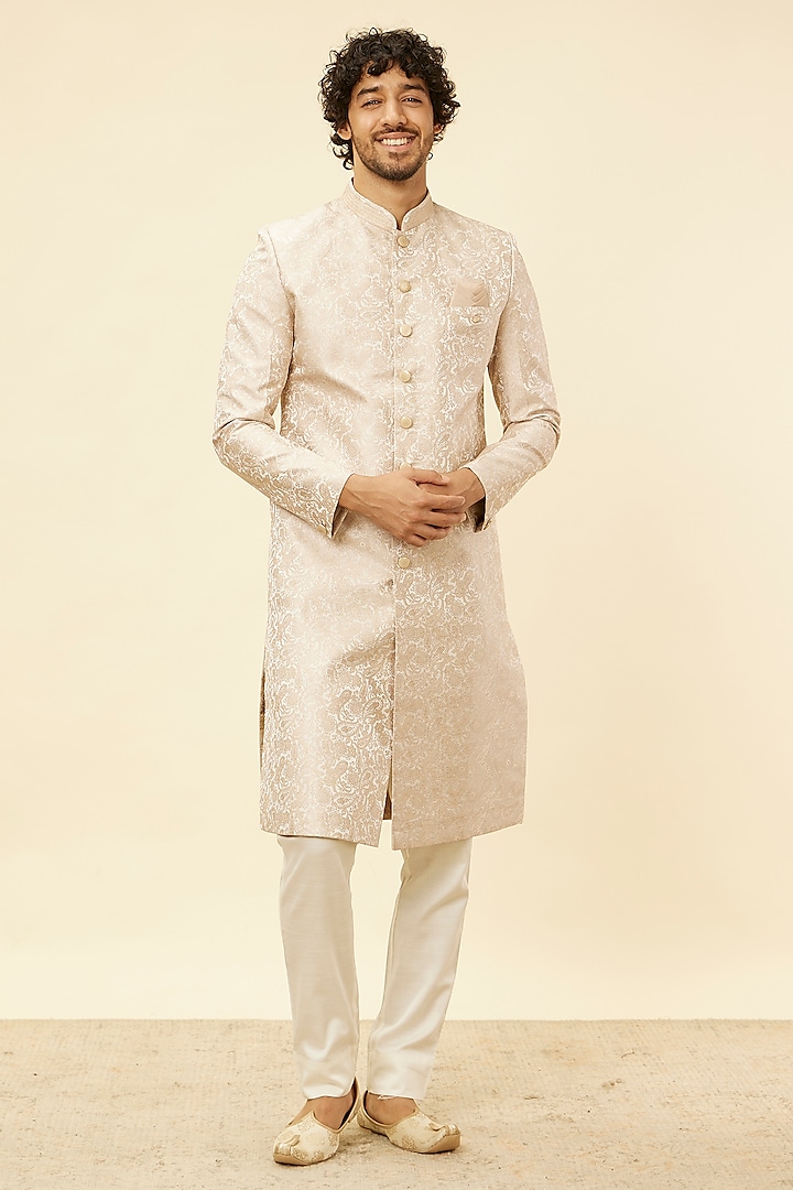 Beige Brocade Self-Textured Sherwani Set by Manyavar