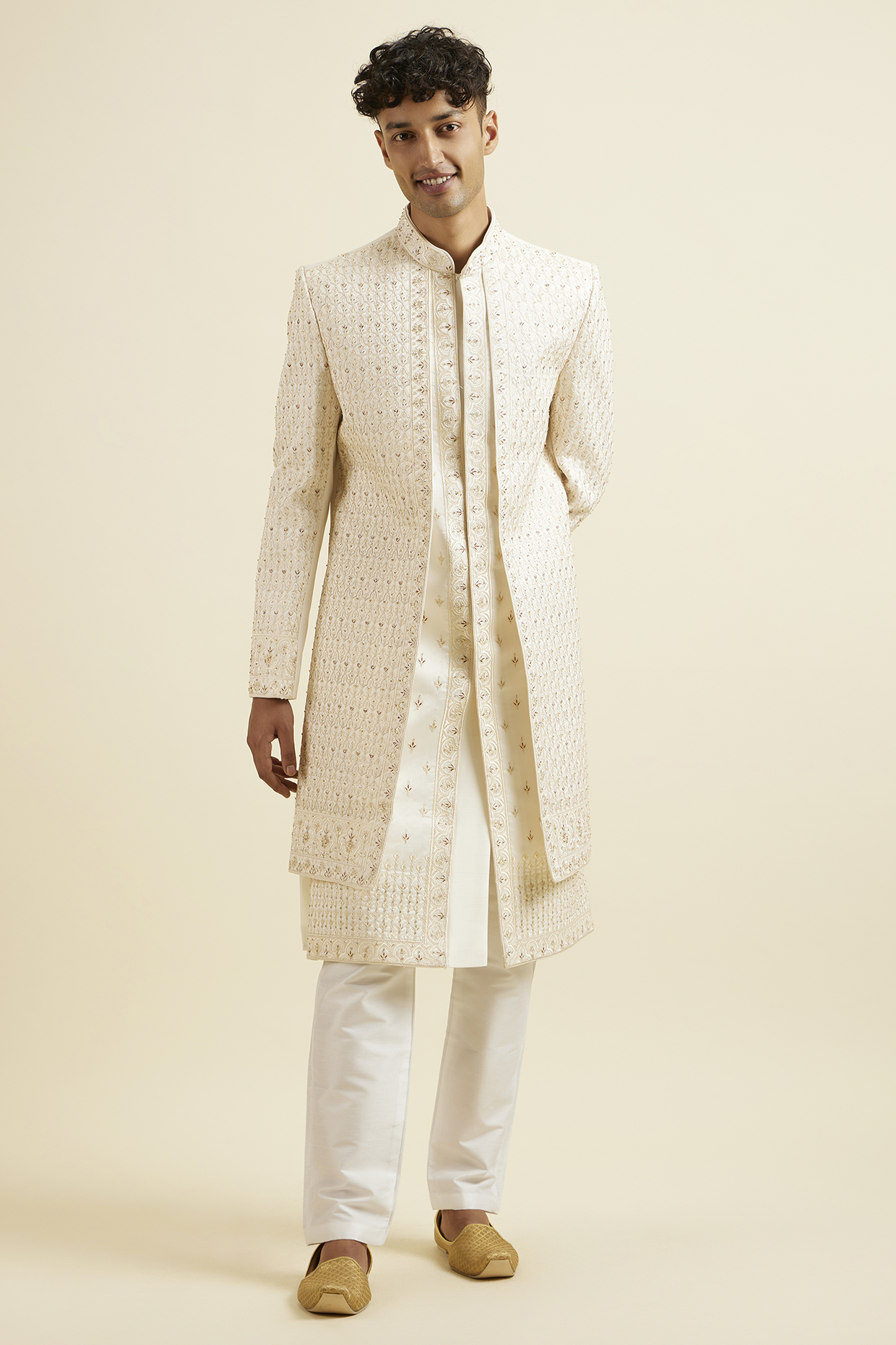 Warm White Art Silk Hand Embroidered Sherwani Set by Manyavar