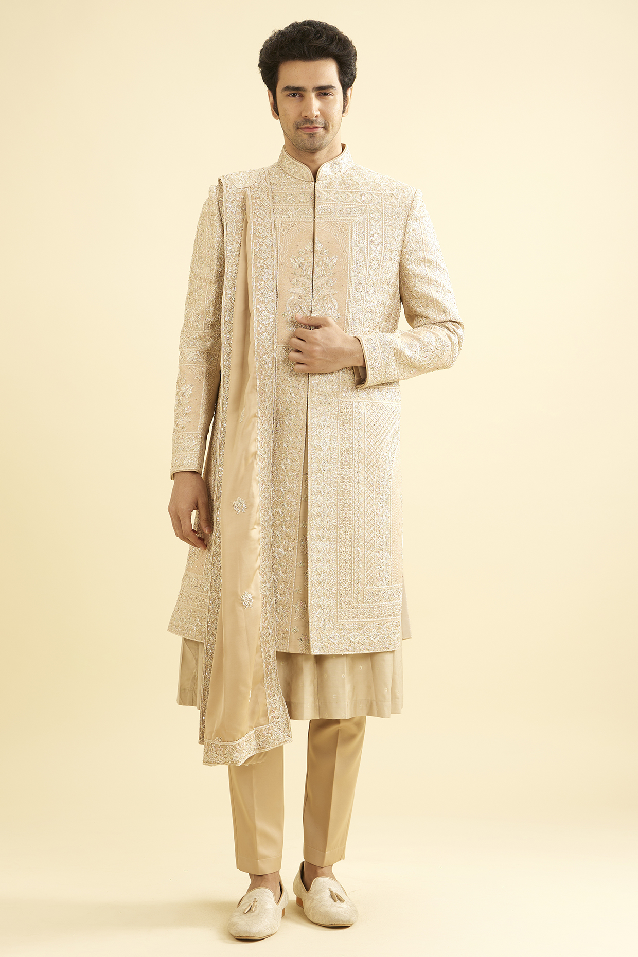 Fawn Colored Satin Embroidered Sherwani Set by Manyavar