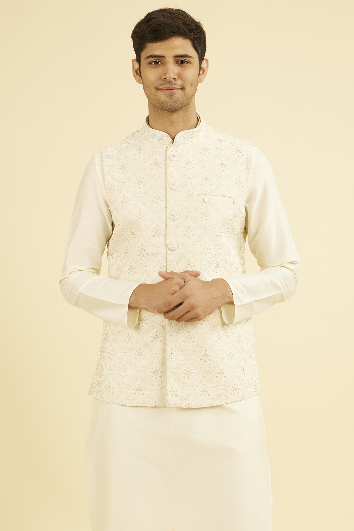 Cream Brocade Sequins Embroidered Nehru Jacket by Manyavar