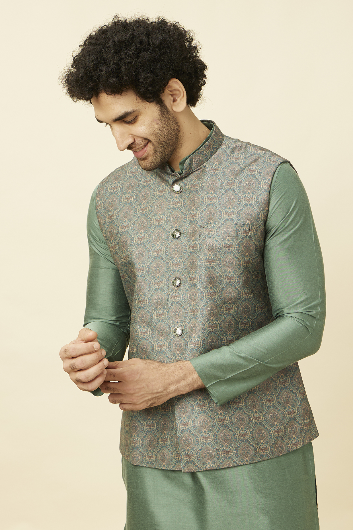 Green Art Silk Medallion Pattern Bundi Jacket by Manyavar at Pernia's Pop Up Shop
