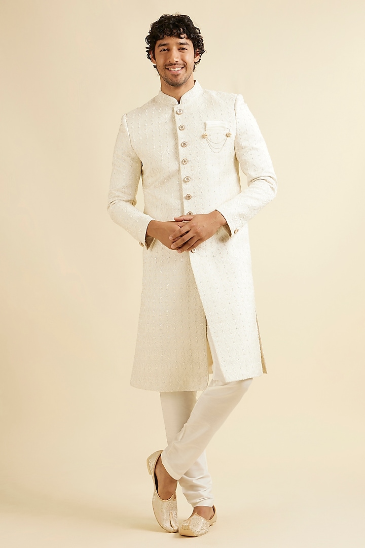 Cream Brocade Self-Textured Sherwani Set by Manyavar