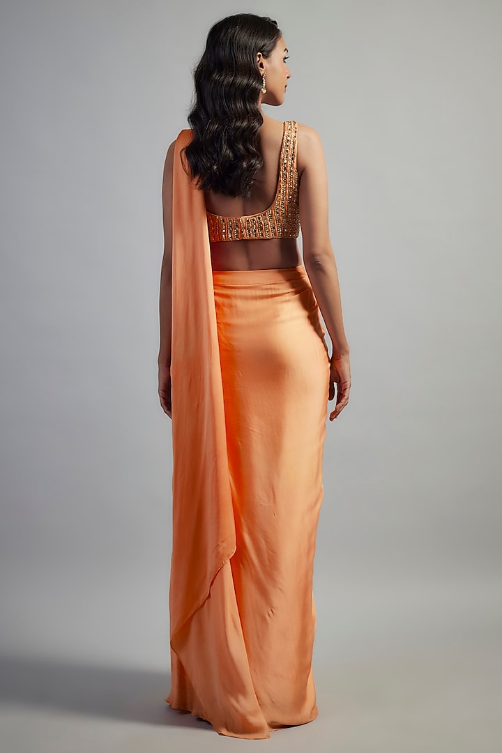 Peach Modal Satin Cutdana Hand Embroidered Layered Skirt Party Wear Saree Set by Mahek Rohra at Pernia's Pop Up Shop