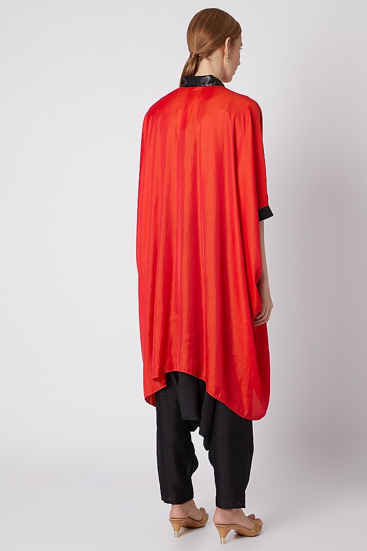 Orange Kaftan Shirt With Black Pants by Mayank Anand & Shraddha Nigam at Pernia's Pop Up Shop