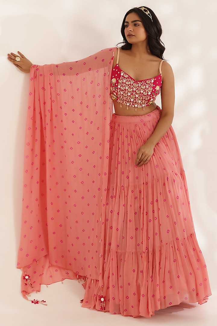 Coral Peach Georgette Tie-Dyed Bandhani Printed Wedding Lehenga Set by MANISHA SONI at Pernia's Pop Up Shop