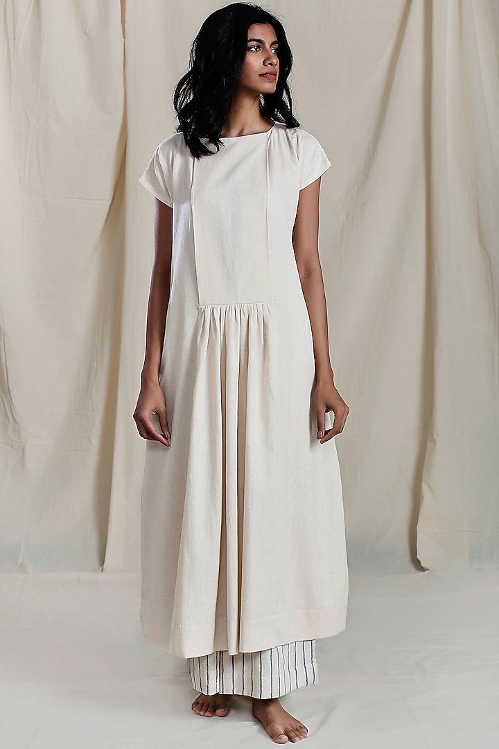 Beige Pleated & Flared Shift Dress by Mati at Pernia's Pop Up Shop