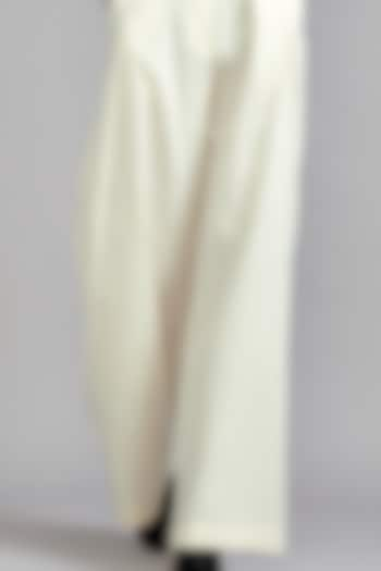 Off-White Cotton Pleated Trousers by Mati at Pernia's Pop Up Shop