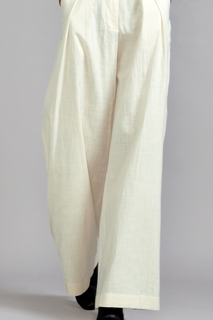 Off-White Cotton Pleated Trousers by Mati at Pernia's Pop Up Shop