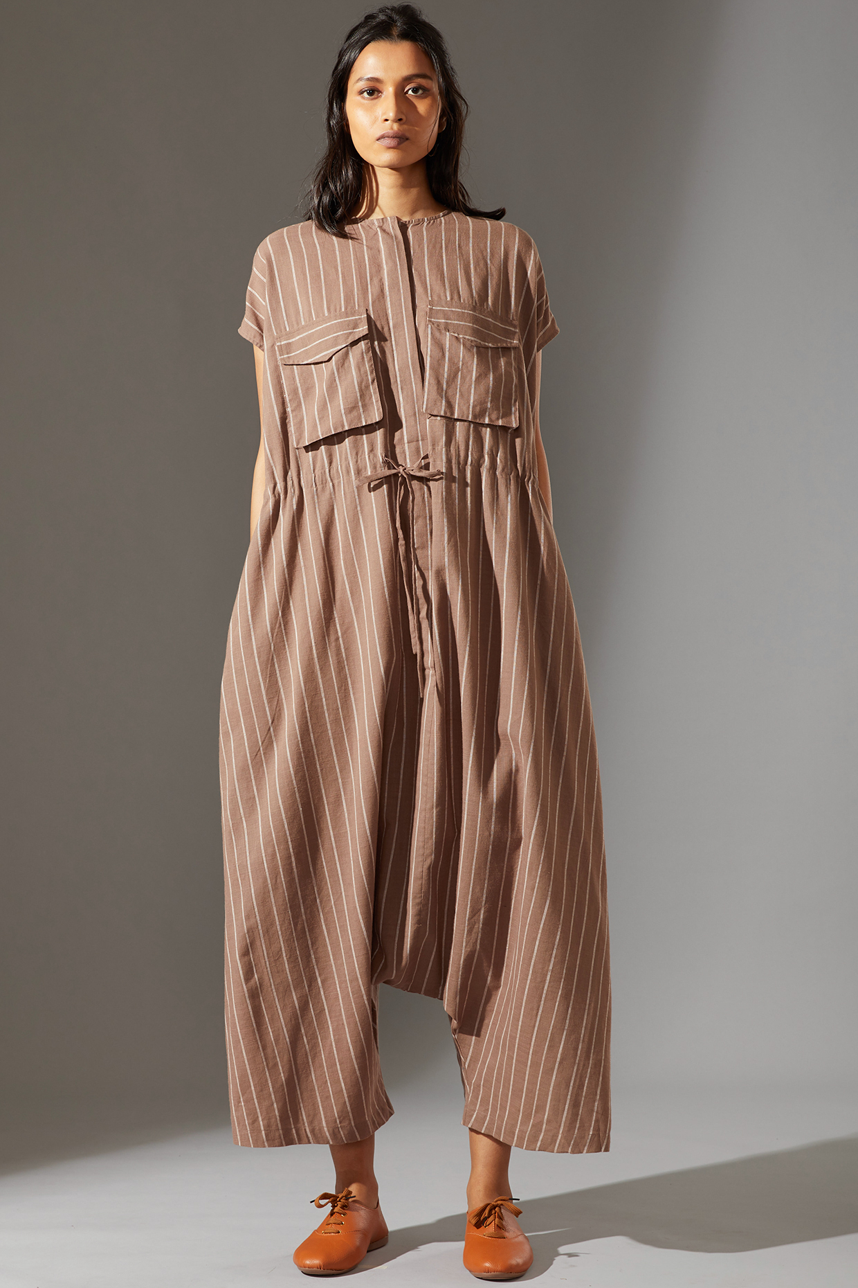 Beige Drawstring Crotch Pants Jumpsuit by Mati at Pernia's Pop Up Shop