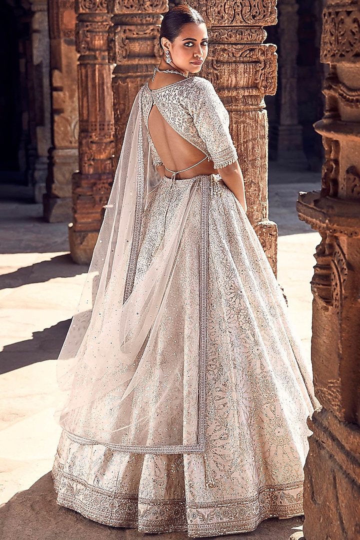 Ivory Raw Silk Dori & Gota Hand Embroidered Bridal Lehenga Set by Matsya at Pernia's Pop Up Shop