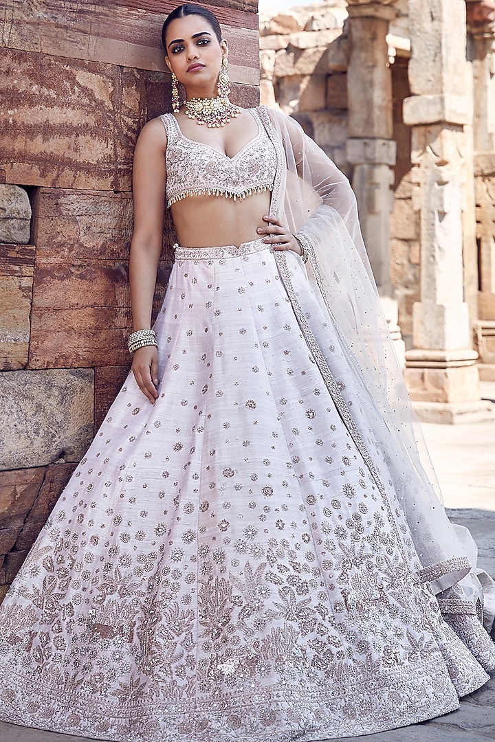 Ivory Raw Silk Dori & Sequins Hand Embroidered Bridal Lehenga Set by Matsya at Pernia's Pop Up Shop