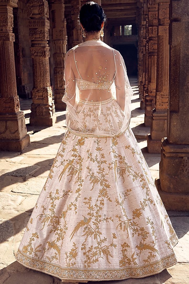 Ivory Raw Silk Dori Hand Embroidered Bridal Lehenga Set by Matsya at Pernia's Pop Up Shop