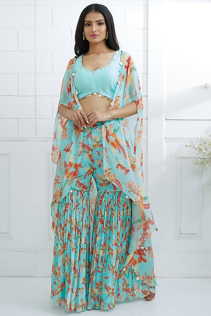 Aqua Blue Embroidered Blouse With Printed Pants & Cape by Mandira Wirk