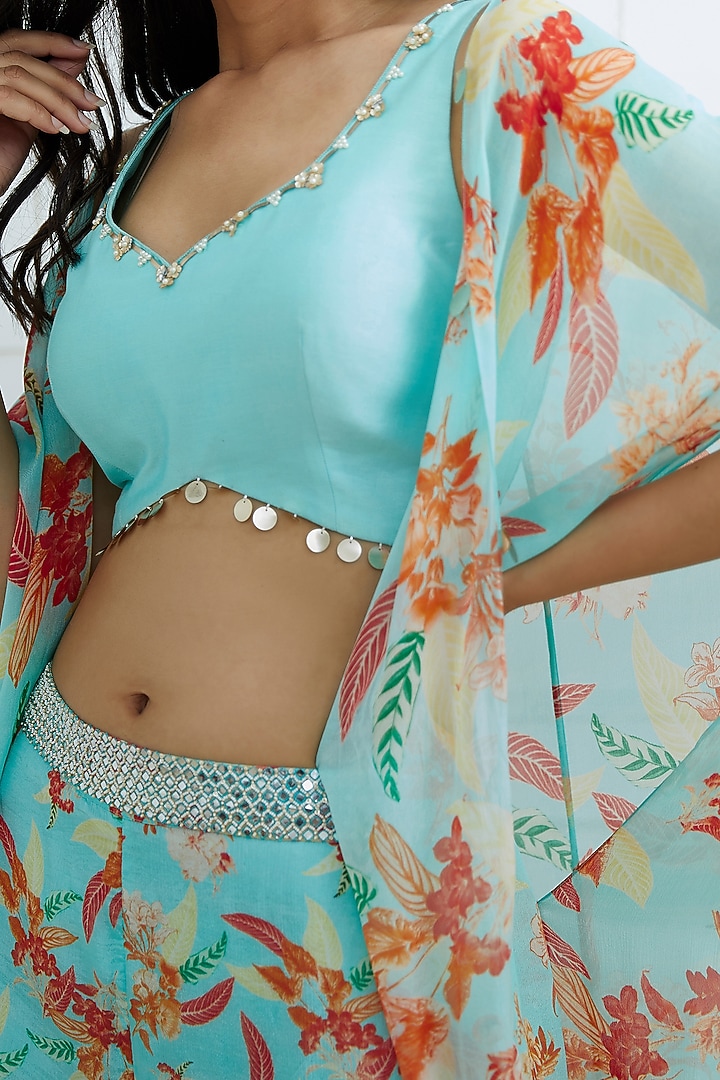 Aqua Blue Embroidered Blouse With Printed Pants & Cape by Mandira Wirk - Indian at Pernia's Pop Up Shop