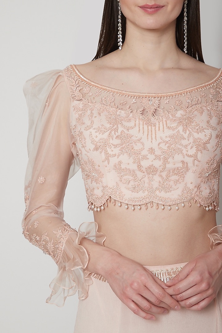 Soft Peach Embroidered Crop Top With Wedding Lehenga by Mandira Wirk - Indian at Pernia's Pop Up Shop