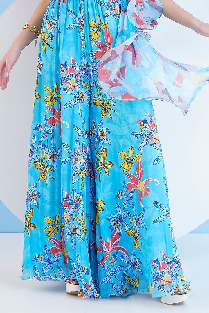 Teal Blue Chiffon Botanical Printed Flared Jumpsuit by Mandira Wirk - Resort at Pernia's Pop Up Shop