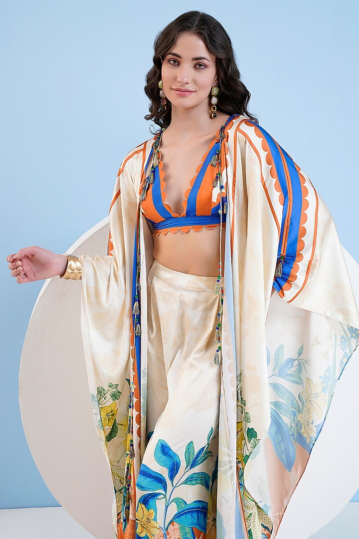 Ivory Satin Floral Printed Cape Set by Mandira Wirk - Resort at Pernia's Pop Up Shop