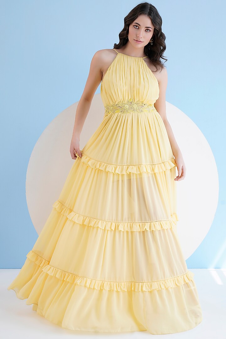 Yellow Viscose Georgette Embroidered Halter Maxi Dress by Mandira Wirk