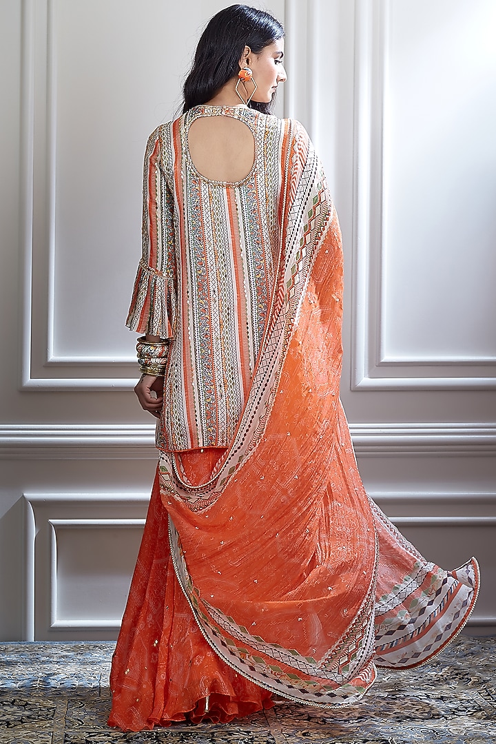 Ivory & Coral Wedding Sharara Set With Mirror Embellishments by Mandira Wirk - Indian at Pernia's Pop Up Shop