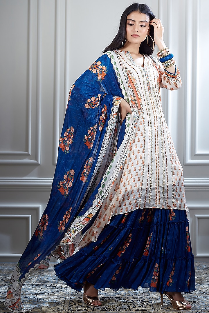 Ivory & Blue Sharara Set With Mirror Embellishment by Mandira Wirk at Pernia's Pop Up Shop