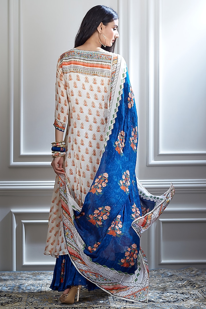 Ivory & Blue Wedding Sharara Set With Mirror Embellishment by Mandira Wirk - Indian at Pernia's Pop Up Shop