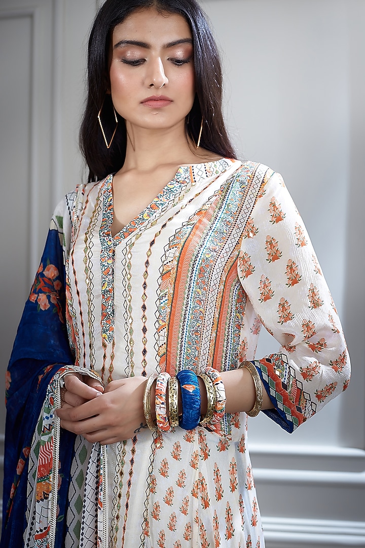 Ivory & Blue Wedding Sharara Set With Mirror Embellishment by Mandira Wirk - Indian at Pernia's Pop Up Shop