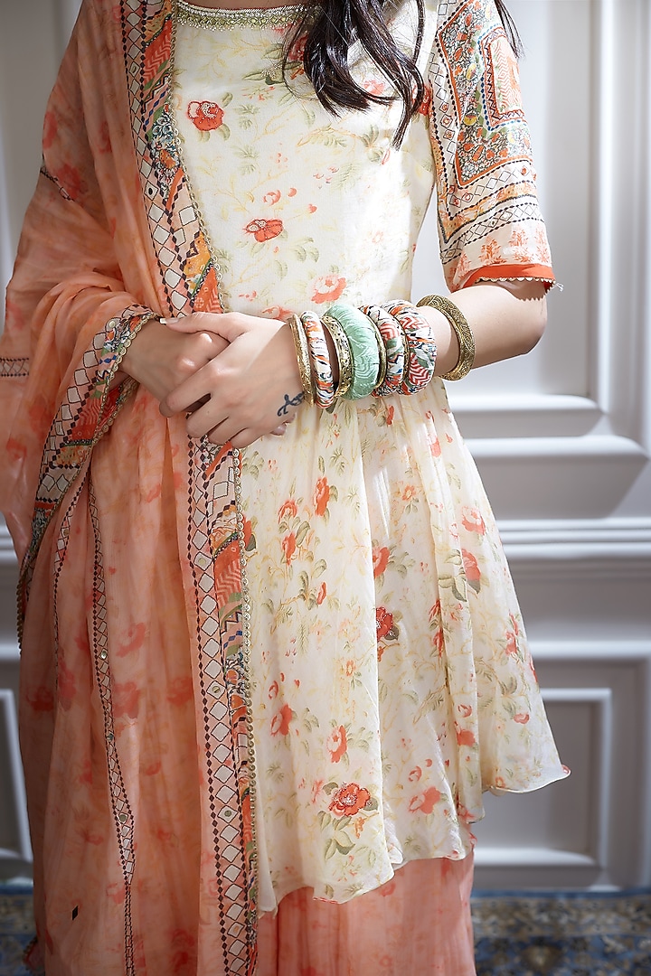 Ivory & Orange Printed Asymmetric Kurta Set by Mandira Wirk - Indian at Pernia's Pop Up Shop