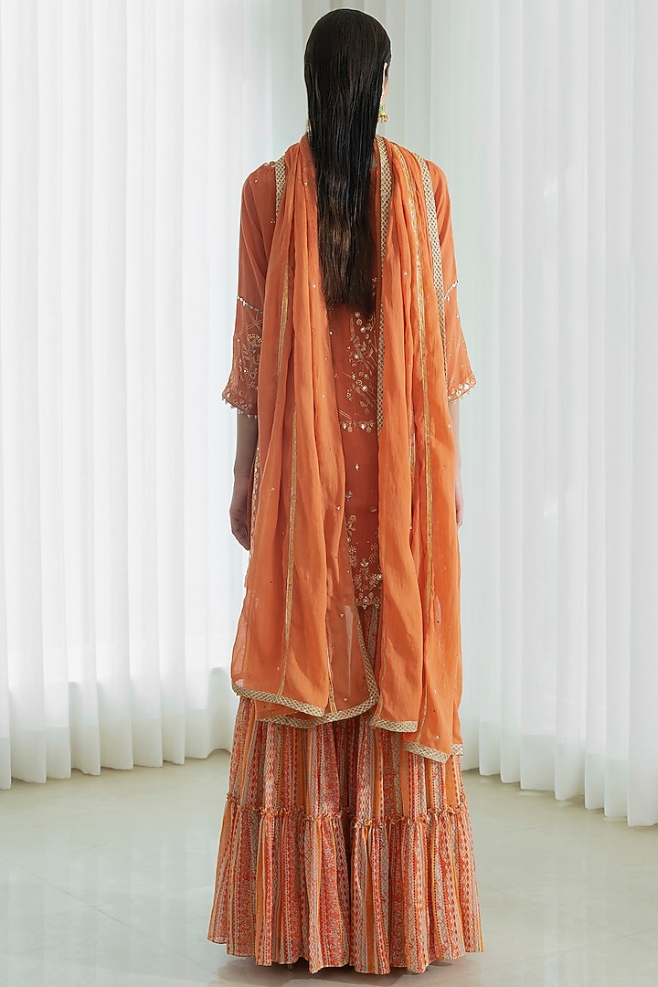 Rust Mulmul Tiered Wedding Sharara Set by Mandira Wirk - Indian at Pernia's Pop Up Shop