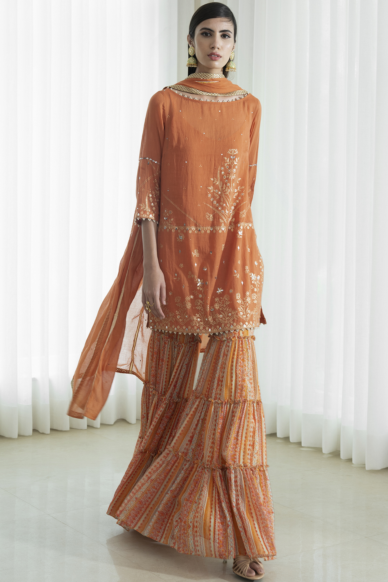 Rust Chanderi Tiered Party Wear Sharara Set by Mandira Wirk - Indian at Pernia's Pop Up Shop