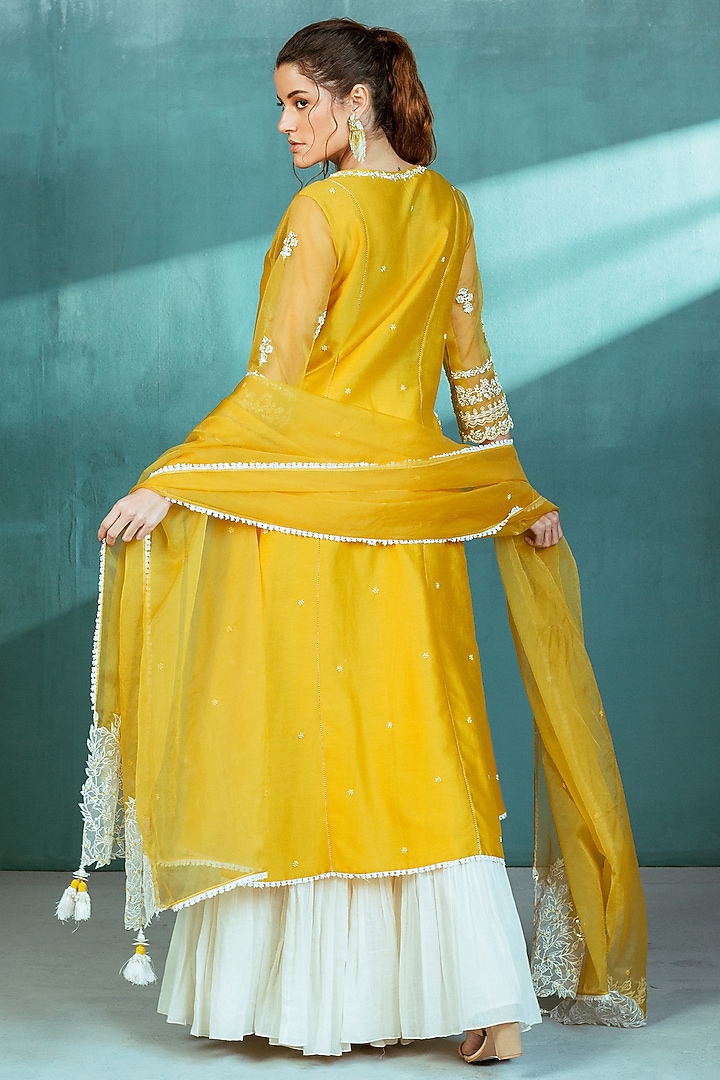 Ivory Mul Mul Tiered Wedding Sharara Set by Mandira Wirk - Indian at Pernia's Pop Up Shop