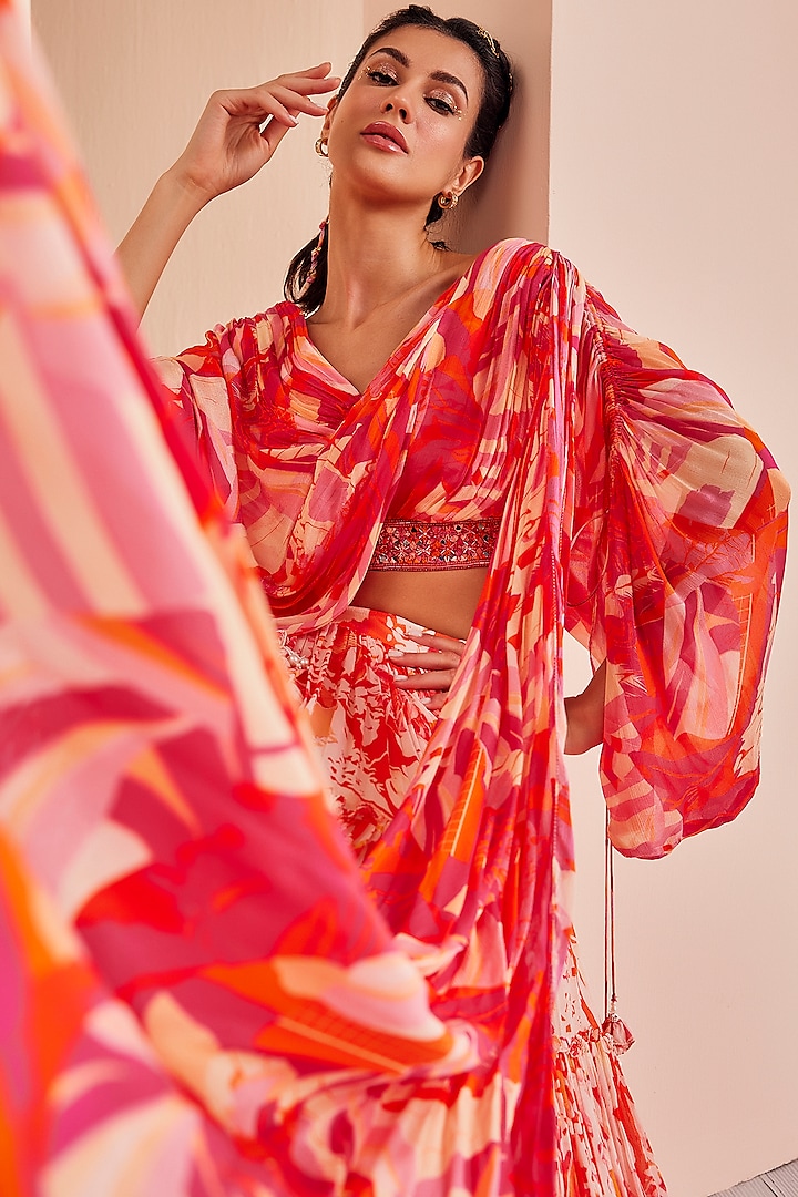 Orange Chiffon Printed Tiered Wedding Lehenga Set by Mandira Wirk - Indian at Pernia's Pop Up Shop
