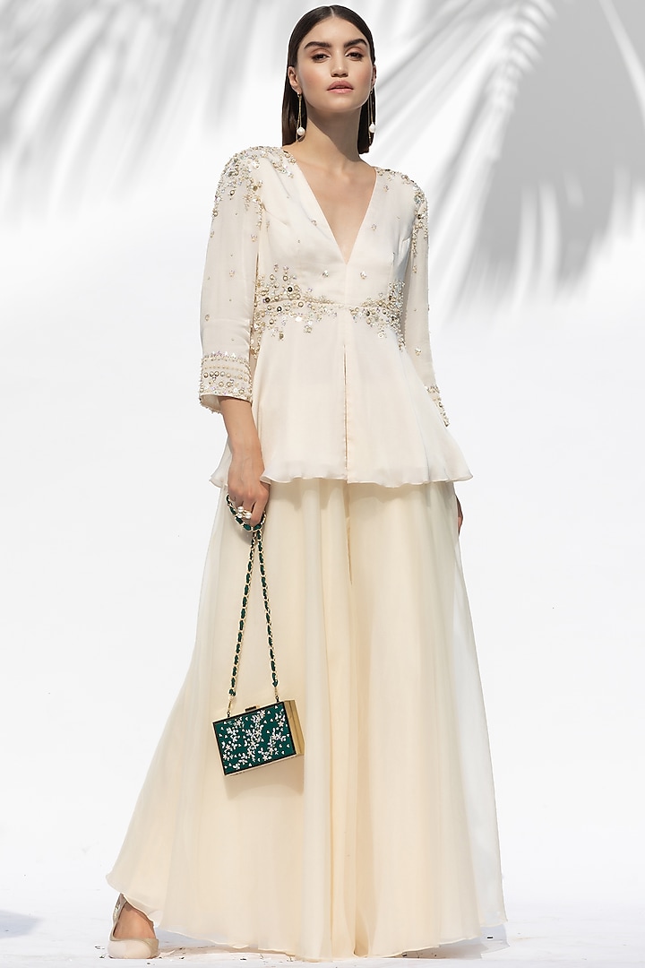 Turquoise Hand Embroidered Clutch by Mandira Wirk - Indian at Pernia's Pop Up Shop