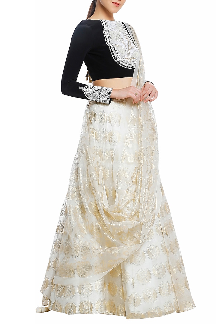 Black embroidered blouse with ivory printed lehenga set available only at Pernia's Pop Up Shop.