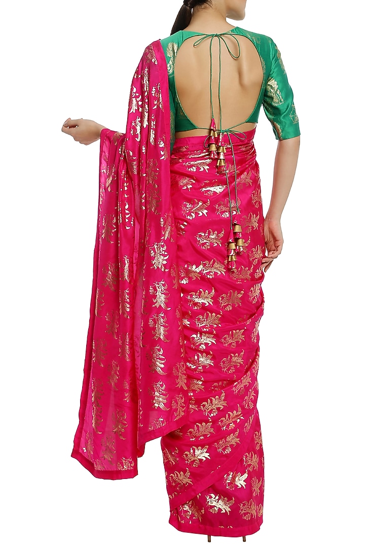 Fuschia pink printed saree with green blouse piece available only at Pernia's Pop Up Shop.