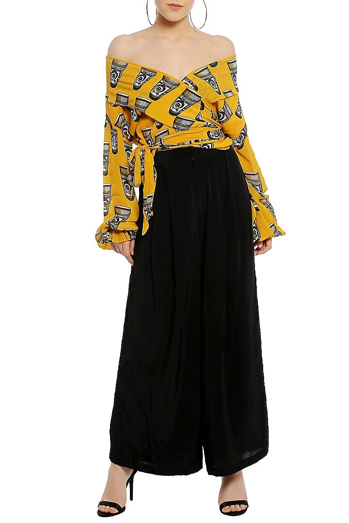 Yellow off shoulder printed wrap top with black palazzo pants available only at Pernia's Pop Up Shop.