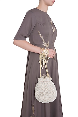 Beige Embroidered Velvet Batwa Potli by Malaga