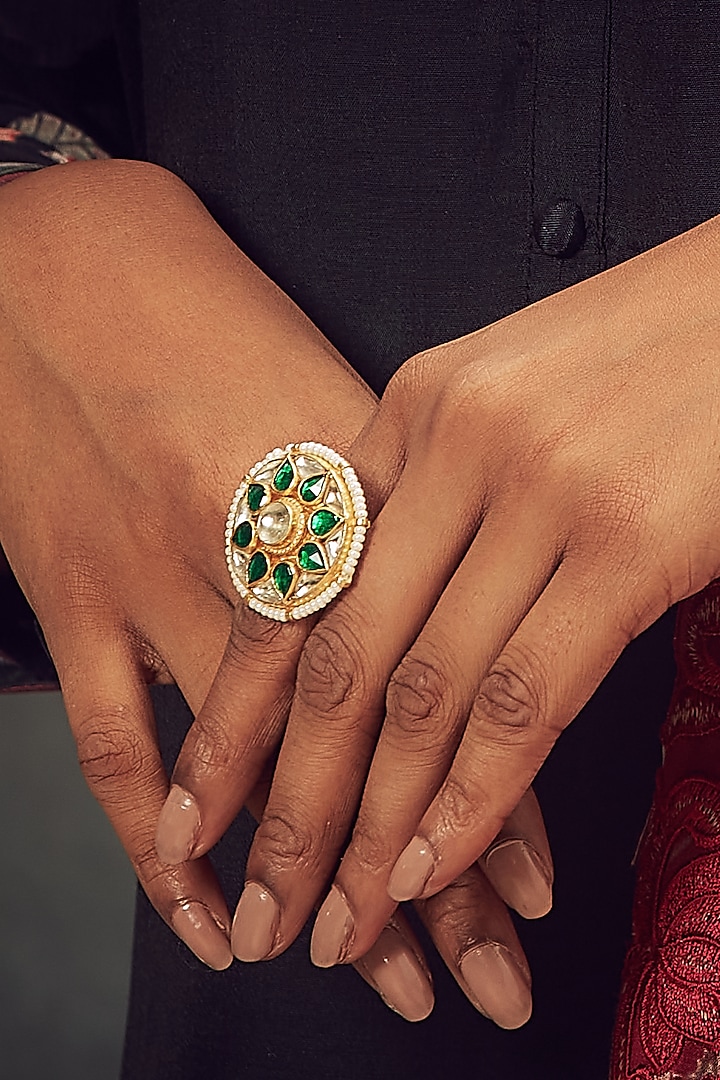 Gold Finish Ring With Green Stones by Maisara Jewelry at Pernia's Pop Up Shop