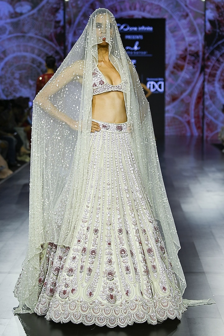 Ecru Tulle Embroidered Bridal Lehenga Set by Megha Bansal at Pernia's Pop Up Shop