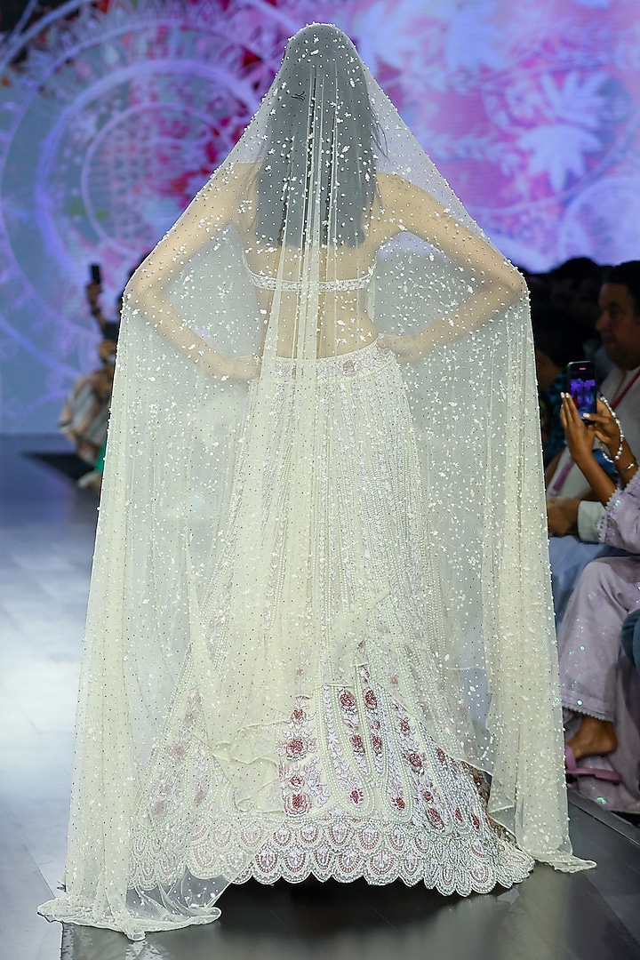 Ecru Tulle Embroidered Bridal Lehenga Set by Megha Bansal at Pernia's Pop Up Shop