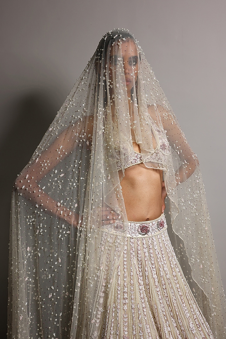 Ecru Tulle Embroidered Bridal Lehenga Set by Megha Bansal at Pernia's Pop Up Shop