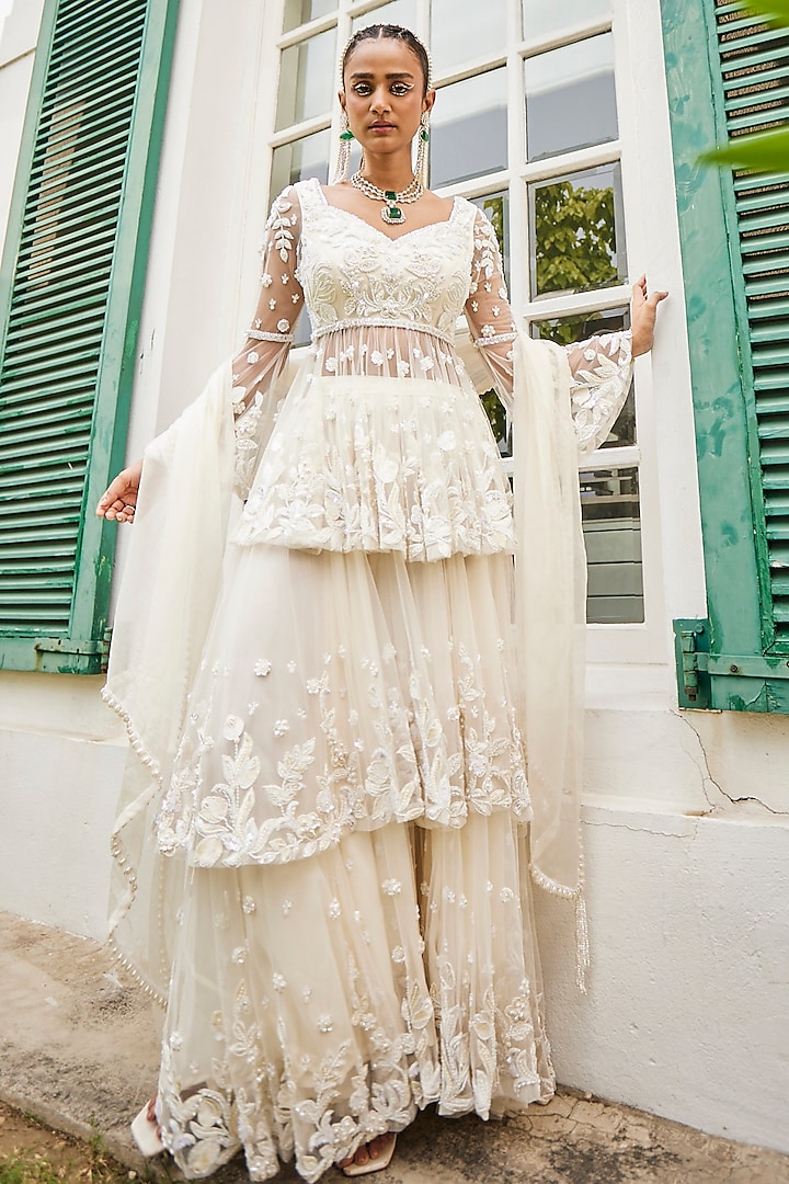 Ivory Crepe & Net Pearl Embroidered Double Layered Sharara Set by Mani Bhatia at Pernia's Pop Up Shop